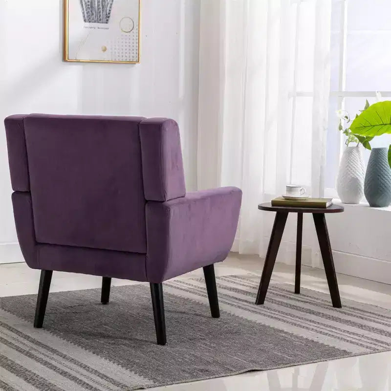 Fauteuil moderne avec revêtement capitonné et pieds en bois