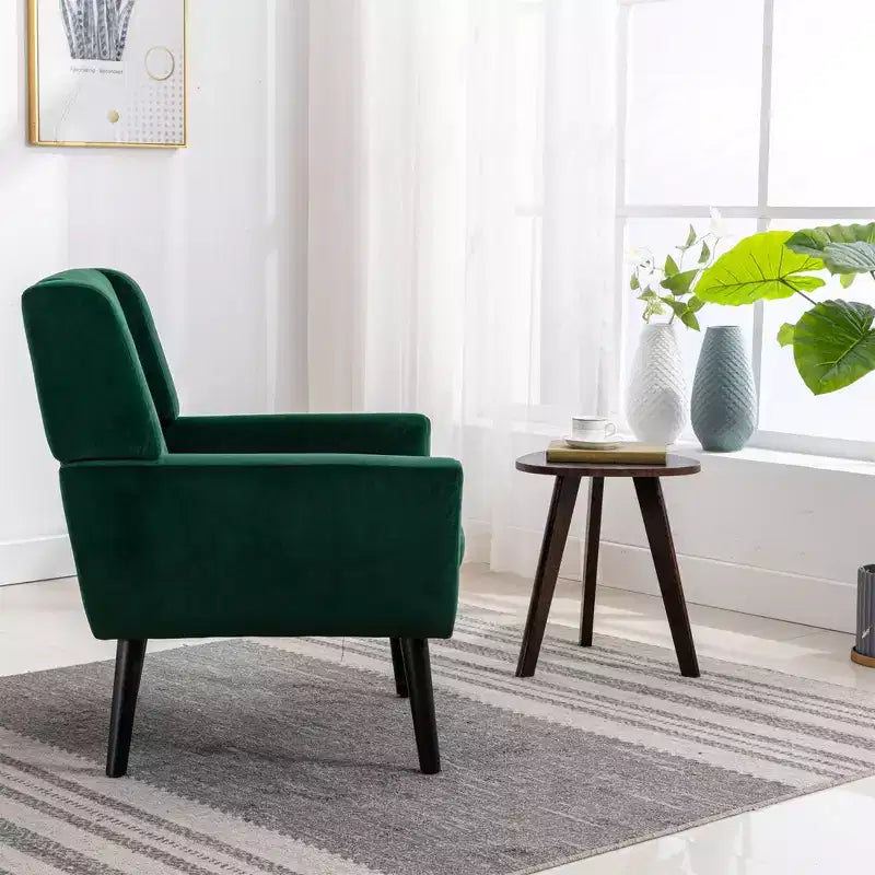 Fauteuil moderne avec revêtement capitonné et pieds en bois