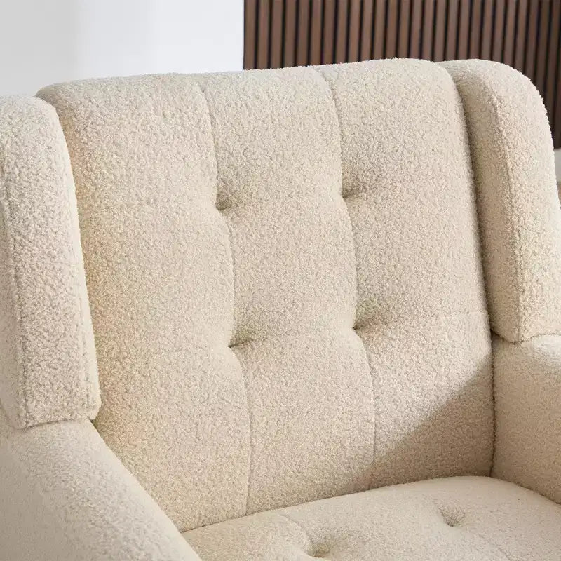 Fauteuil moderne avec revêtement capitonné et pieds en bois