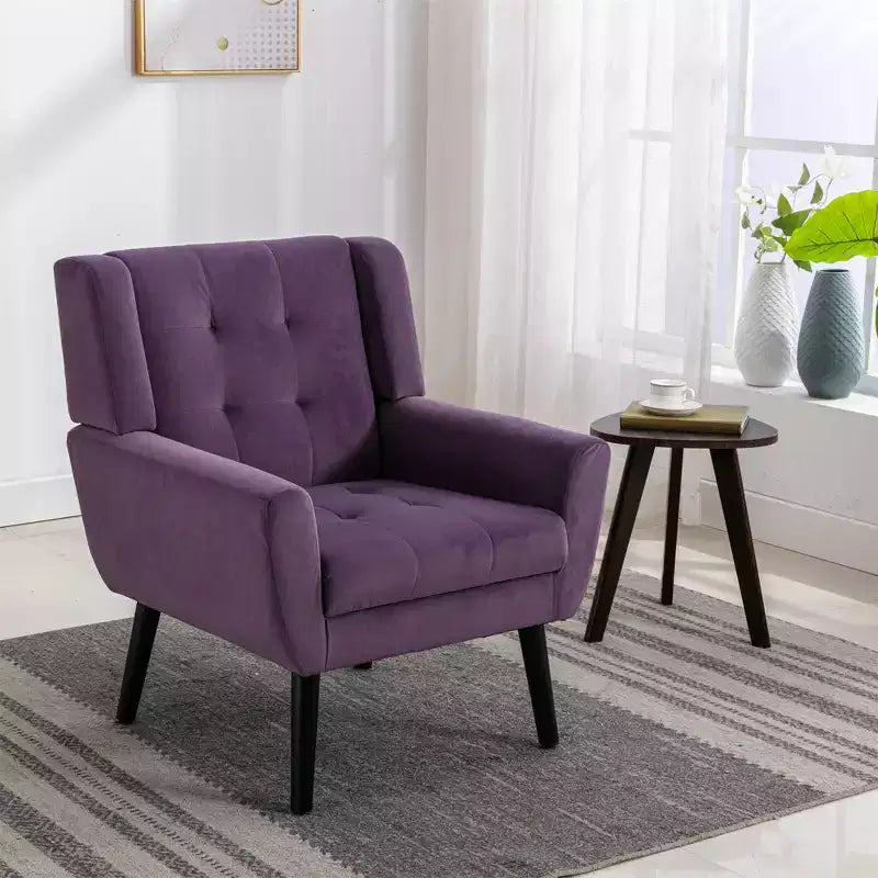 Fauteuil moderne avec revêtement capitonné et pieds en bois