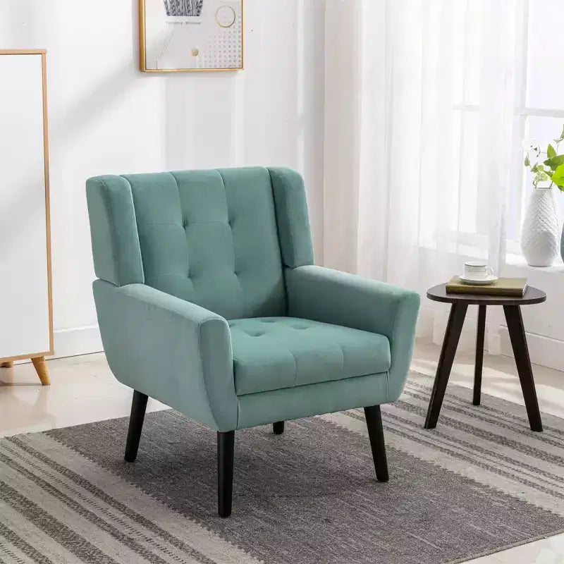 Fauteuil moderne avec revêtement capitonné et pieds en bois