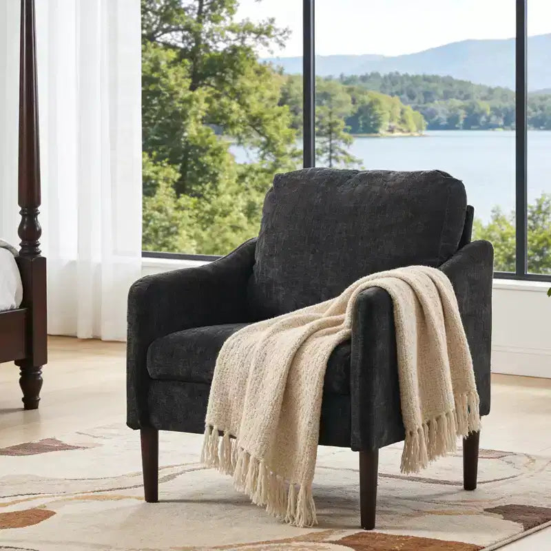 Fauteuil d'appoint rembourré avec accoudoirs incurvés et assise à ressorts ensachés
