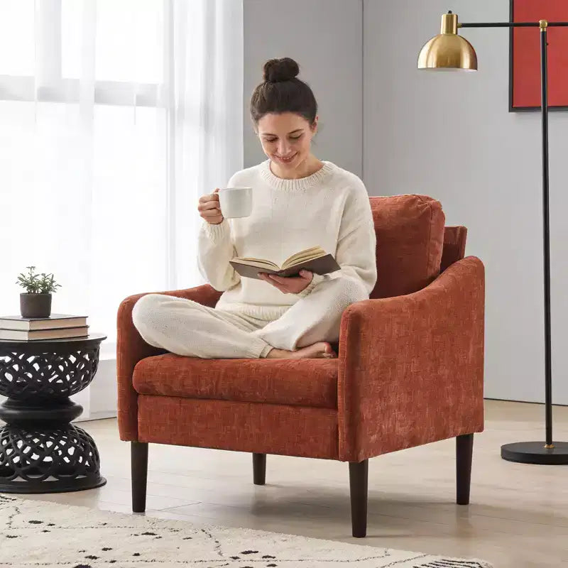 Fauteuil d'appoint rembourré avec accoudoirs incurvés et assise à ressorts ensachés