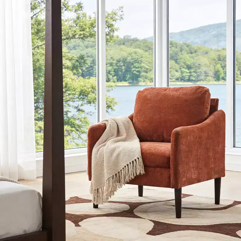 Fauteuil d'appoint rembourré avec accoudoirs incurvés et assise à ressorts ensachés