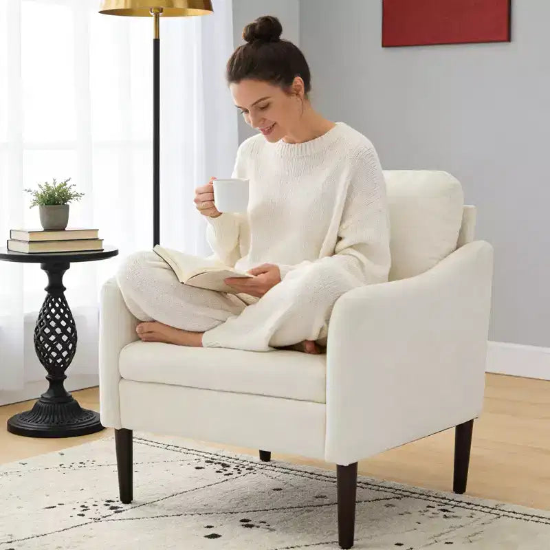 Fauteuil d'appoint rembourré avec accoudoirs incurvés et assise à ressorts ensachés