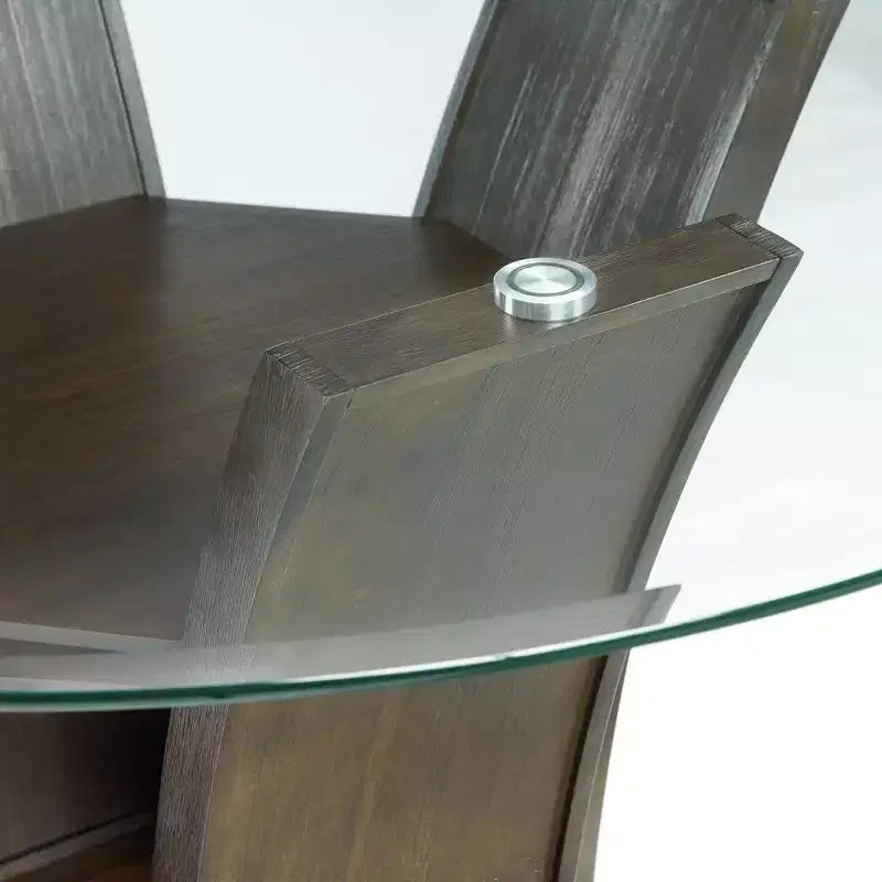 Table de salle à manger ronde avec plateau en verre et pied central